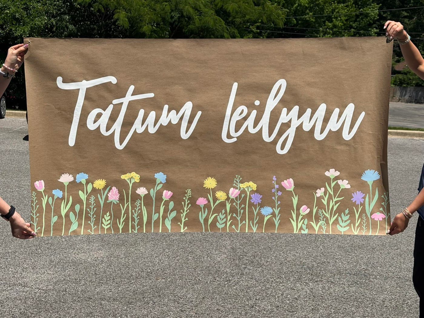 Custom name banner with hand-painted wildflowers